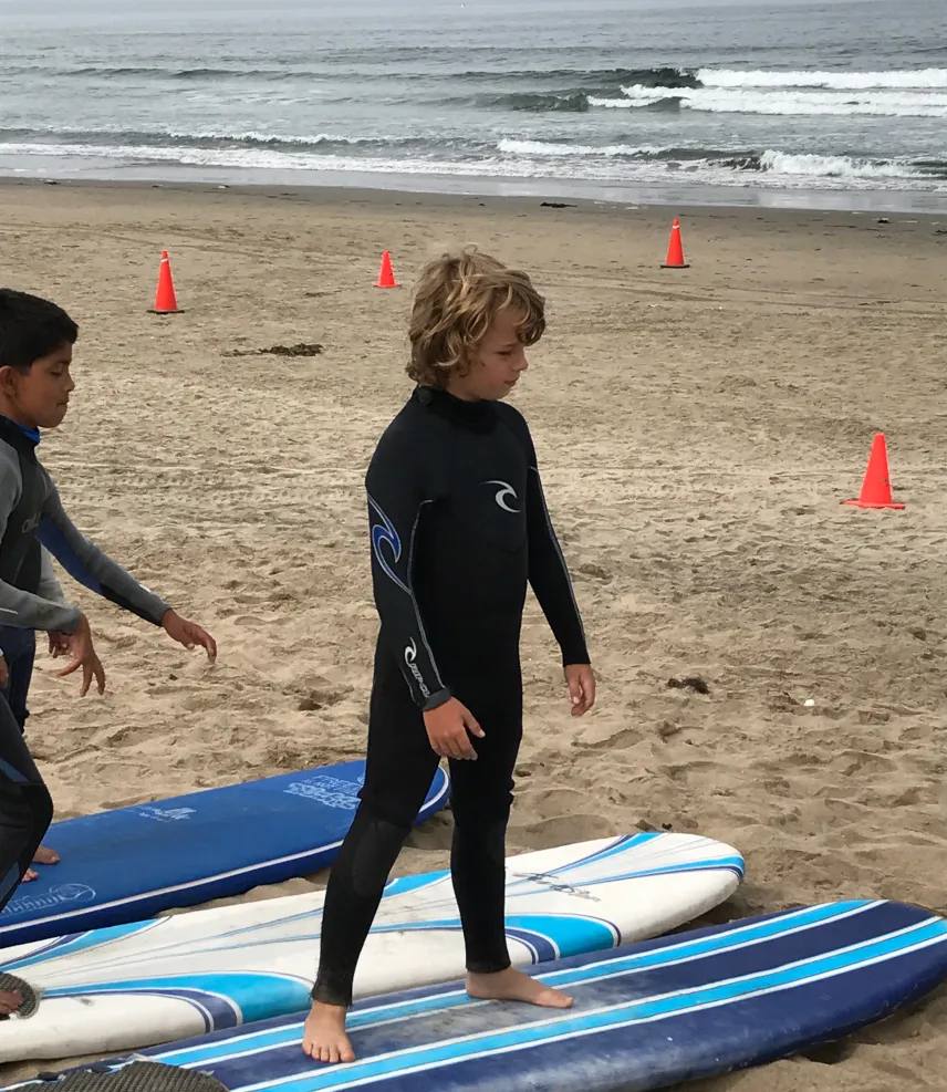 Picture of surfing kid in Ensenada