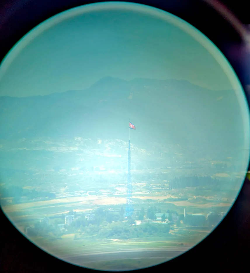 Picture of North Korean flag through a telescope