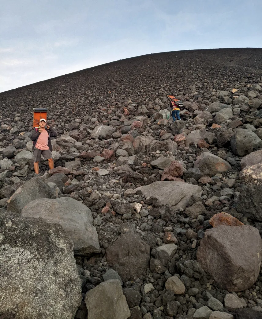 Picture of Porters carrying the boards up Cerro Negro