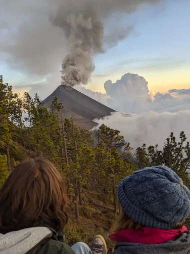 Photo of Carina and Philipp watching an active volcano